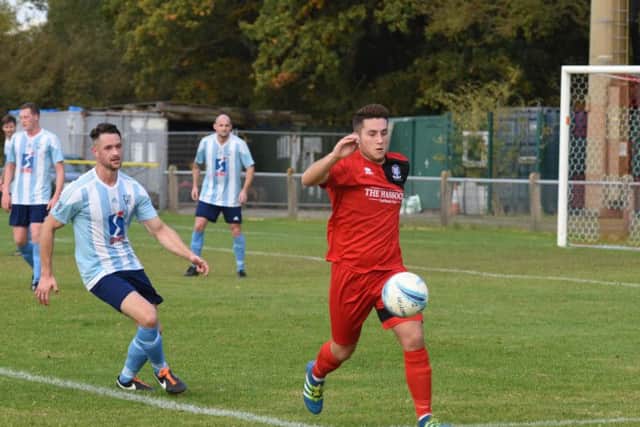 Lewis Westlake. Action from Hassocks v Worthing United. Picture by Phil Westlake