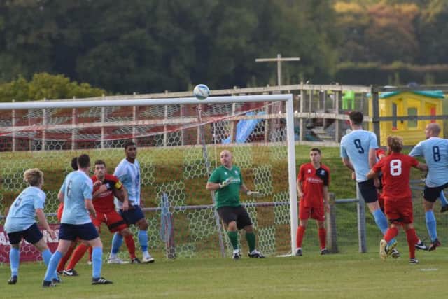 Action from Hassocks v Worthing United. Picture by Phil Westlake