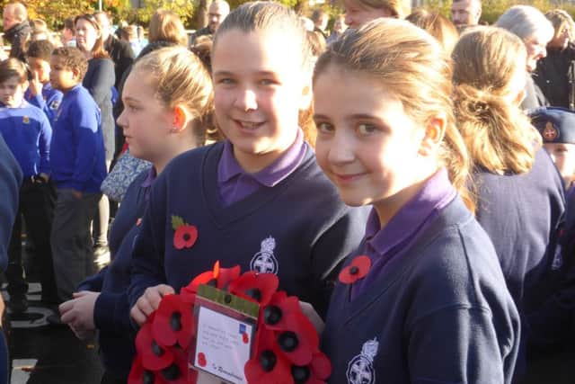 Hollie Kaye and Sarah Bee from the 2nd Burgess Hill Girls' Brigade laid the Girls' Brigade wreath. Picture: 2nd Burgess Hill Girls' Brigade