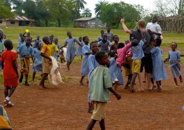 Jed Powell taking part in a Sports Day event while volunteering in Nigeria