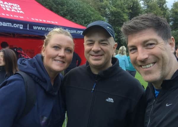 Vega employees Karen Halil, Hal Halil, Business Development Manager and Tim Dobson, Sales and Commercial Director ready for a trek on the South Downs Way in aid of the Dame Vera Lynn Children's Charity - picture courtesy of Vega