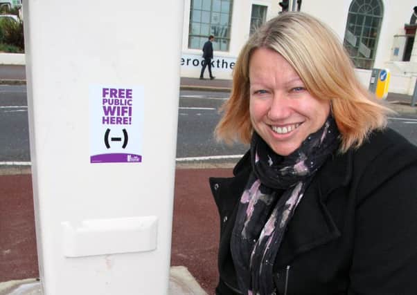 Cllr Dawn Poole at one of the hotspots stencil in the pavement near the pier SUS-161025-123718001