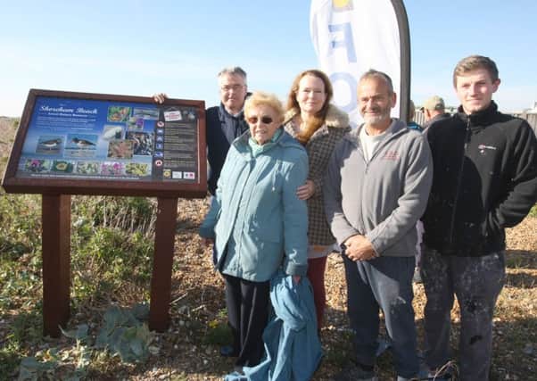 Tim Loughton MP unveils information boards on Shoreham Beach with members of the Friends of Shoreham Beach group. Picture: Derek Martin
