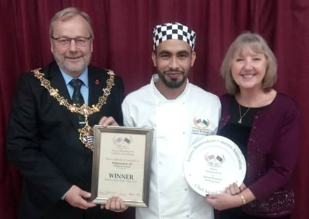 Sussex Bangladeshi Caterers Association curry chef of the year winner Mohammed Ali, 28, from Worthing, pictured with Mayor of Worthing Sean McDonald.