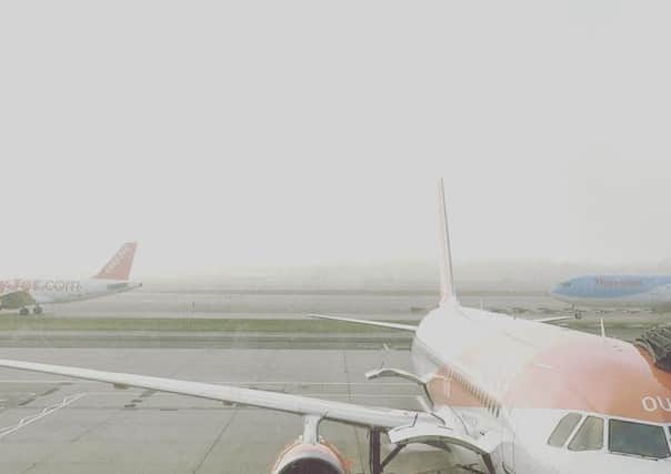 Thick fog has caused hours of delays at London airports this morning. Picture: Luisa Tatoli