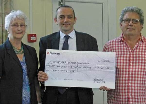 Stephanie Dickinson, LCEO of Natwest South Downs, and Mark Shuttleworth, branch manager of Natwest Chichester, presented the donation cheque to the Chichester Stroke Club chairman Ann Manville and club volunteer Graeme Maidmen