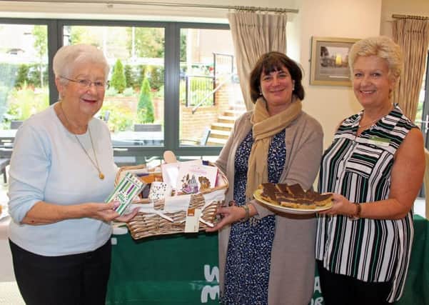Winner (Mavis Welland) with Arabella Madge from Midhurst MacMillan, and Trudy Jolly  the Concierge at Turner House