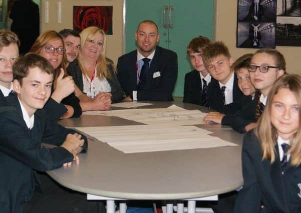 A selection of students who attended the workshop along with staff from Novus Property Solutions