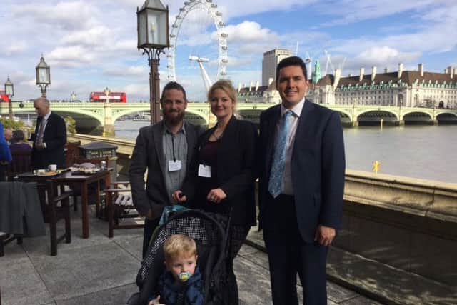 (L-R) Ed Usher, Freddie Norton-Usher, Lottie Norton and Huw Merriman MP at the Houses of Parliament terrace SUS-161027-152928001