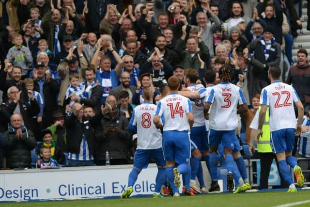 Albion players and fans celebrate Glenn Murray's opener. Picture by Phil Westlake (PW Sporting Photography)