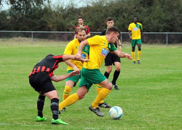 Tom Jefkins on the attack for Sids against Rottingdean / Picture by Kate Shemilt