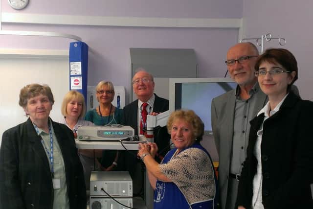 Crawley Hospital League of Friends donate Â£12,500 for new scanner (L-R) consultants Cinzia Voltolina and George Richter, League of Friends treasurer Celia Putland, Susan Swetman, Pam Pritchard, League of Friends vice chairman David Hawkins and fundraiser Maria Hains ENGSUS00120130927114834