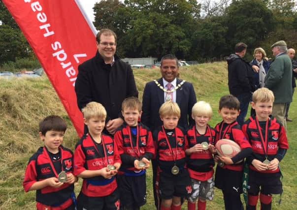 Heath Mayor, Sujan Wickremaratchi and Councillor Jonathan Ash-Edwards celebrate a great day of rugby with Heath Under 7s.