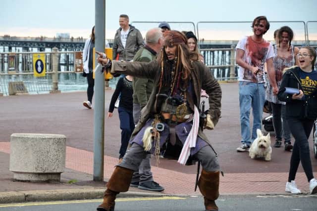 Captain Jack Sparrow opens pirate shop on Hastings pier. Photo by Sid Saunders. SUS-161030-062534001