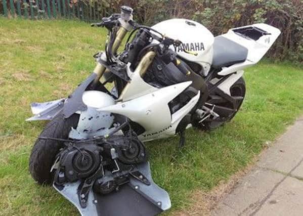 The white Yamaha motorcycle was abandoned following the collision last Friday (October 28). Picture by Sussex Police.