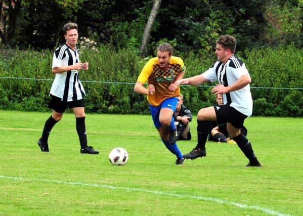 James Sandford in action for Lavant - he was on target against Wisboro Green / Picture by Kate Shemilt