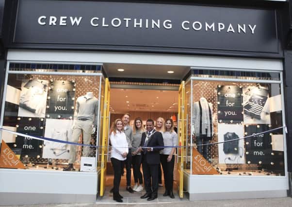 Left to Right, store members, Kirstie, Rees, Ella, Ellie and Debbie at the official ribbon cutting with the mayor. Picture by Crew Clothing Company.