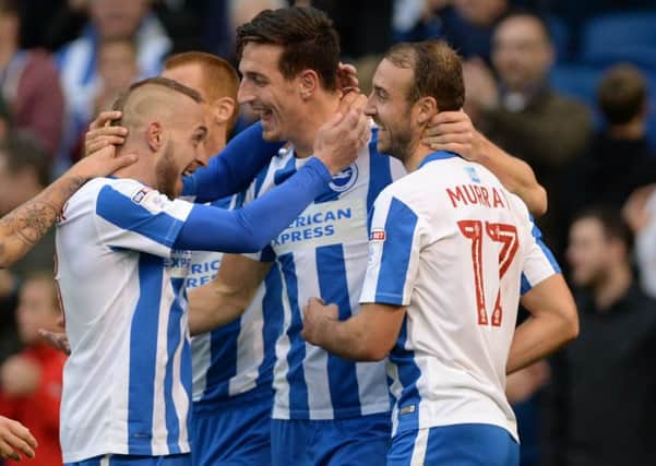 Albion players celebrate Lewis Dunk's goal in the 5-0 win against Norwich on Saturday. Picture: Phil Westlake (PW Sporting Photography)