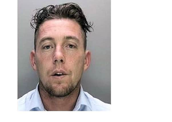 Johnny Glasheen, 30, a tree surgeon may be driving a white pick-up truck. Picture by Sussex Police.