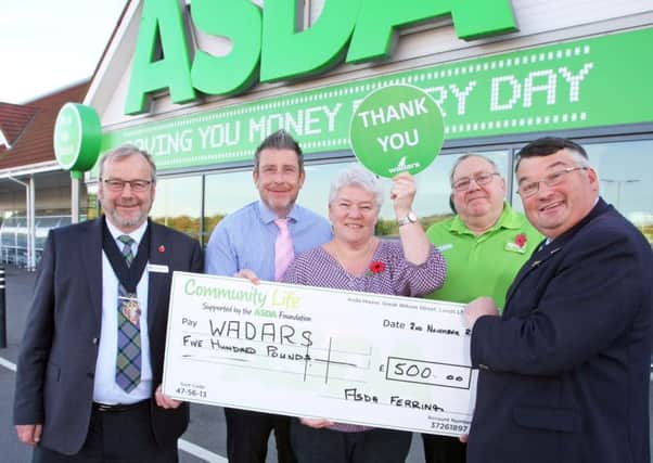 ASDA, Ferring donates Â£500 to WADARS as part of its Green Token Scheme. L to R Mayor Cllr Sean McDonald, store manager Scott Mount, Tracy Cadman from WADARS, Mick Kelly, ASDA community colleague, and Cllr Bob Smytherman