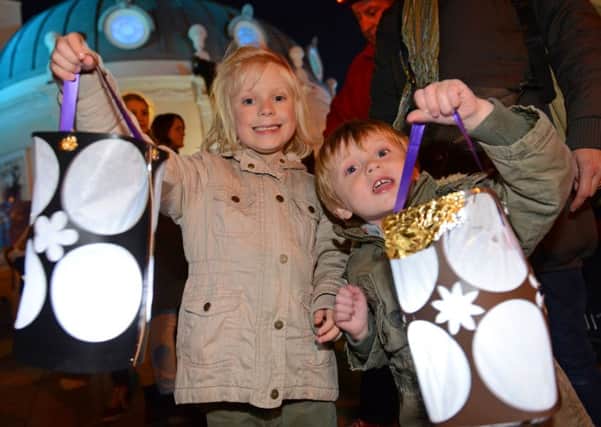 Jeannie Wardrop, 6, and brother Arthur, 3, with their lanterns at last year's event