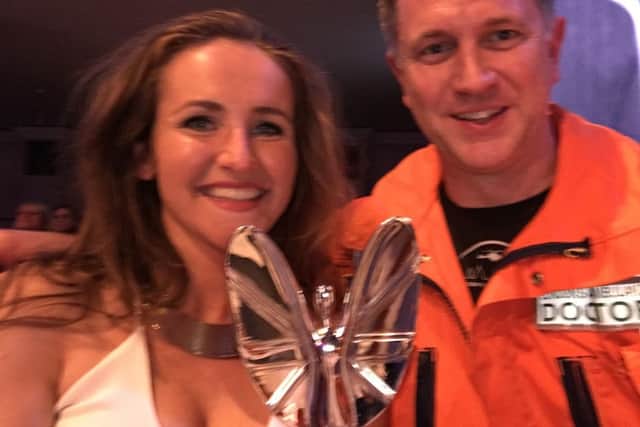 Dr Simon Walsh, 46, from Rustington, at the Pride of Britain awards with Victoria Lebrec. He helped to save her life when she was involved in an accident with a lorry.