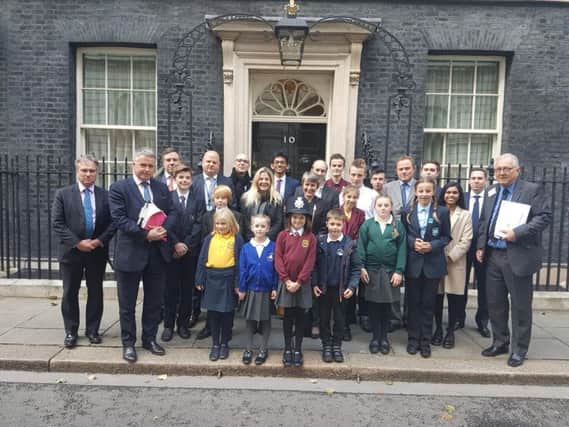 MPs and schoolchildren at 10 Downing Street