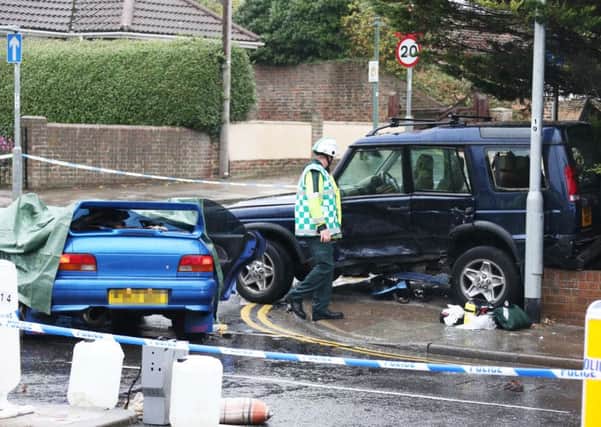The woman, a man driving one of the cars and a man who was a passenger in the other car, sustained injuries, police have said. Picture: Eddie Mitchell.