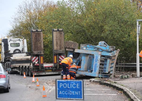 A lorry shed a digger at the Arundel Crossbush interchange. Picture: Eddie Mitchell