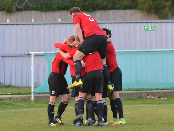 Heath celebrate their goal. Picture by Grahame Lehkyj