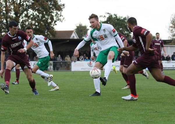 Jimmy Wild tries to find a way through the Bognor defence / Picture by Tim Hale