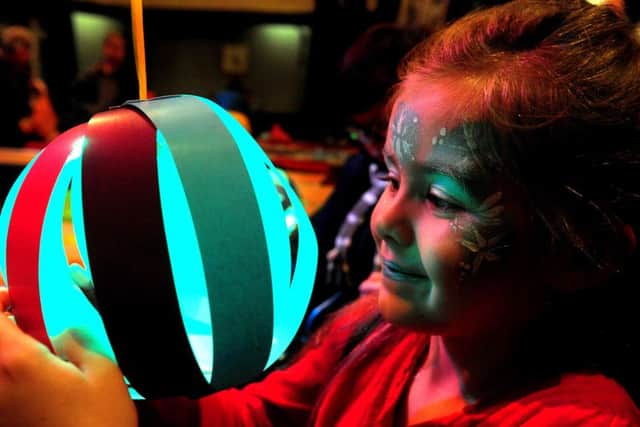 Children got the chance to build lanterns in a free workshop. Picture: Kate Shemilt