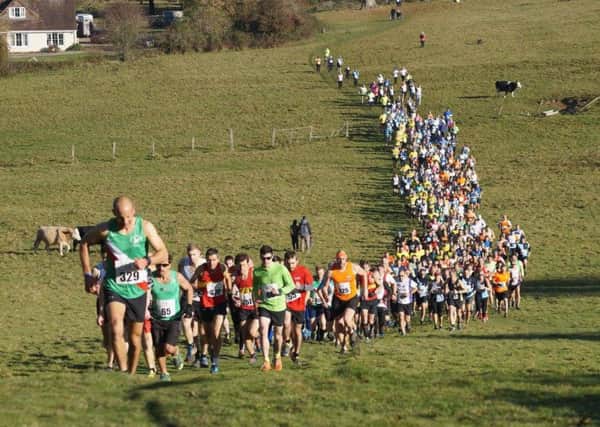 Competitors in the Gunpowder Trot take in one of the course's hills on Sunday