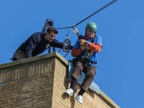 Earlier this year Mr Yeomans took part in a sponsored zip wire descent from Blind Veterans UK's rehabilitation centre in Brighton