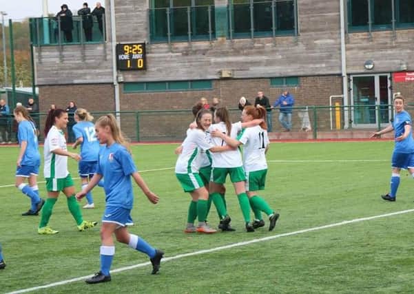 Chi players celebrate Chloe Dowdell's equaliser at Cardiff