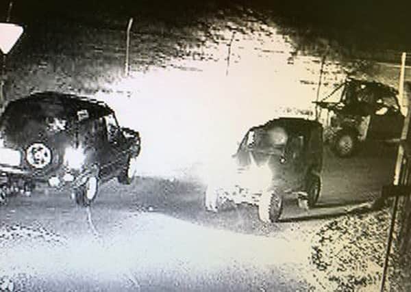 The 4x4s vehicles spotted on CCTV relating to criminal damage on farmland. Photo courtesy of Sussex Police SUS-160811-124735001