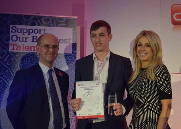 Ben Jackson with his award for winning Cyber Security Challenge UKs Masterclass competition SUS-160811-161458001
