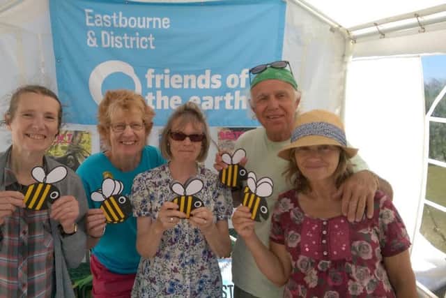Campaigners from Eastbourne Friends of the Earth are concerned about council plans to sell of parts of the South Downs SUS-160911-134453001