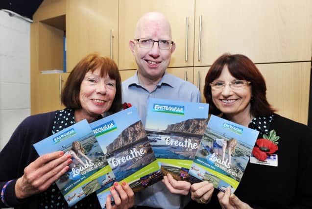 Tourism staff Maria Cassidy, Neil Parmenter and Angela Marsden with the new holiday guide for Eastbourne