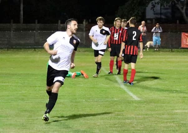 Broadwater midfielder Liam Humphreys celebrates a goal for his Saturday side Pagham. Picture by Roger Smith