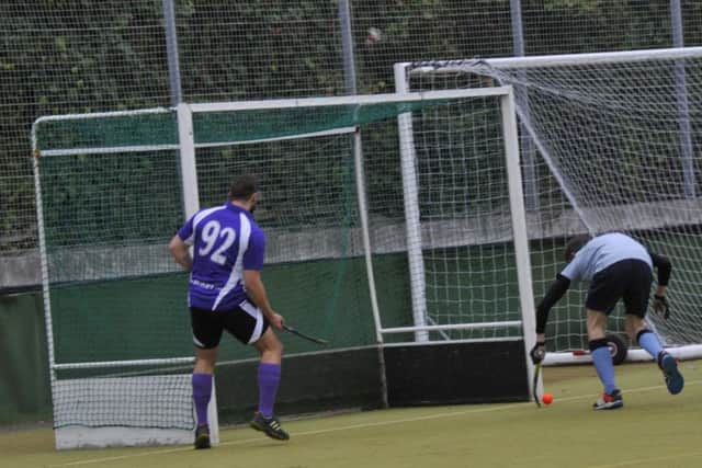 South Saxons defender Chris Meredith superbly hooks the ball off his own goal-line.