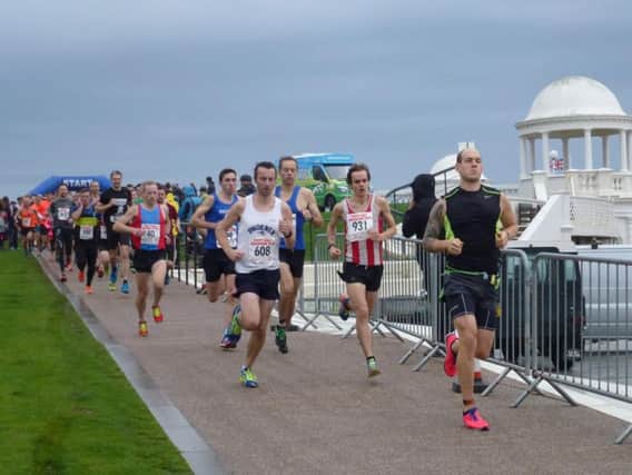 Runners set off from the lawns alongside the De La Warr Pavilion in last year's Poppy Half Marathon.