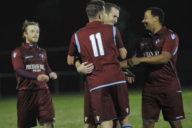 Little Common celebrate their opening goal in Tuesday night's 3-1 victory.