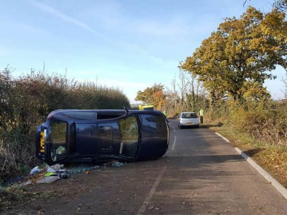 An 88-year-old man has suffered minor injuries after his car overturned near Barcombe this morning (Friday). Photo by Nick Fontana.
