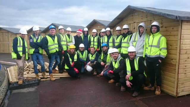 'Incredible team': Luke Johnson with the Construction Department students and teachers