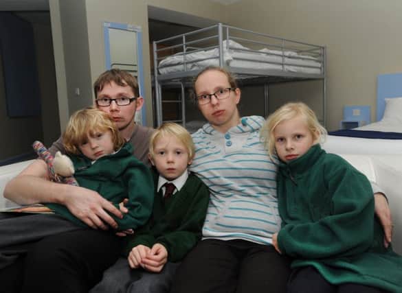 Phillippa and Jamie Lang and their children Samantha, Michael and Kai were made homeless by the blaze
