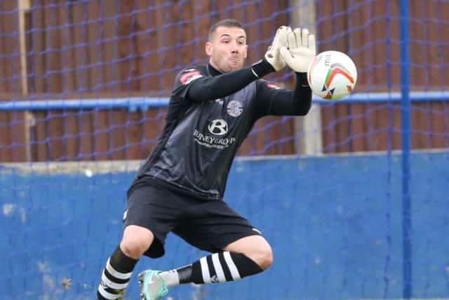 Lenny Pidgeley pulled off several fine saves, one of them from a penalty, in the Hastings United goal. Picture courtesy Scott White