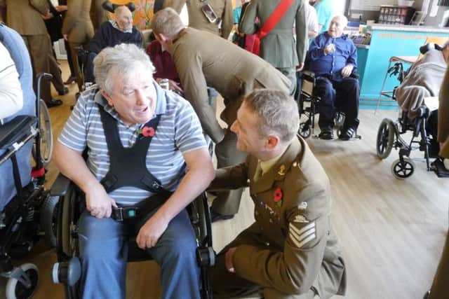 Twenty soldiers from 12 Regiment, Royal Artillery based at Thorney Island, accompanied The Queen Alexandra Hospital Home (QAHH) to the Armistice Day Ceremony at the War Memorial in Worthing on Friday