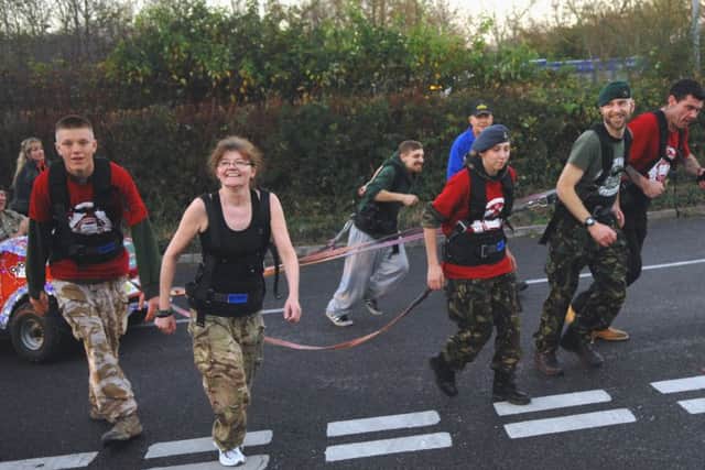 jpco 3-12-14 Royal Marines London to Brighton Sleigh Pull (Pic by Jon Rigby) PPP-140112-113518003