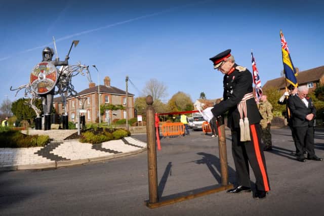 The Lord Lieutenant of East Sussex Peter Field cut the ribbon on the towering sculpture